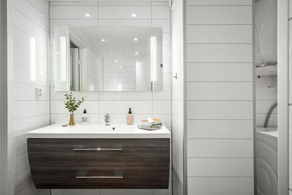 bathroom with satin finish stainless steel appliances